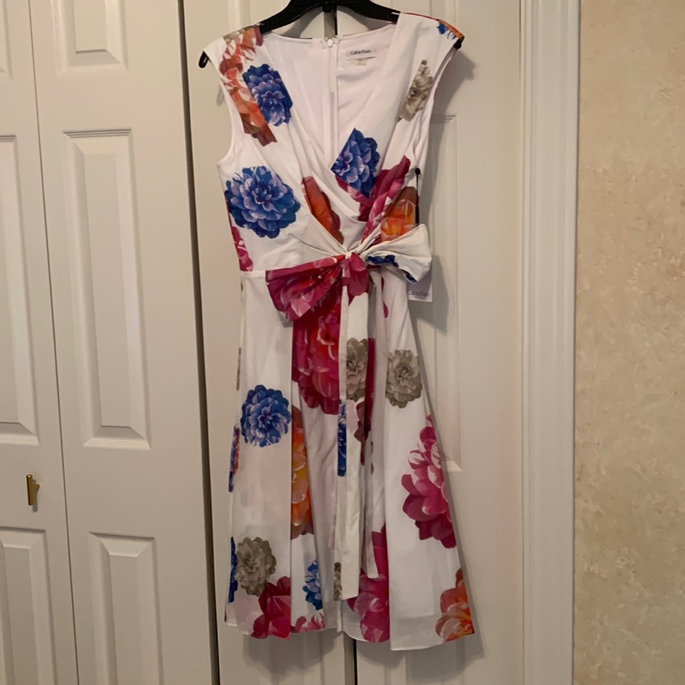 Calvin Klein spring wrap front dress. New with tags, size 8.